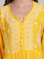 Indian tunic top with chikankari detail, close-up of embroidery