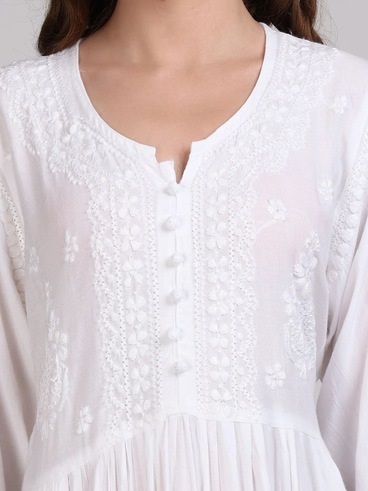 Indian tunic top with chikankari detail, close-up of embroidery