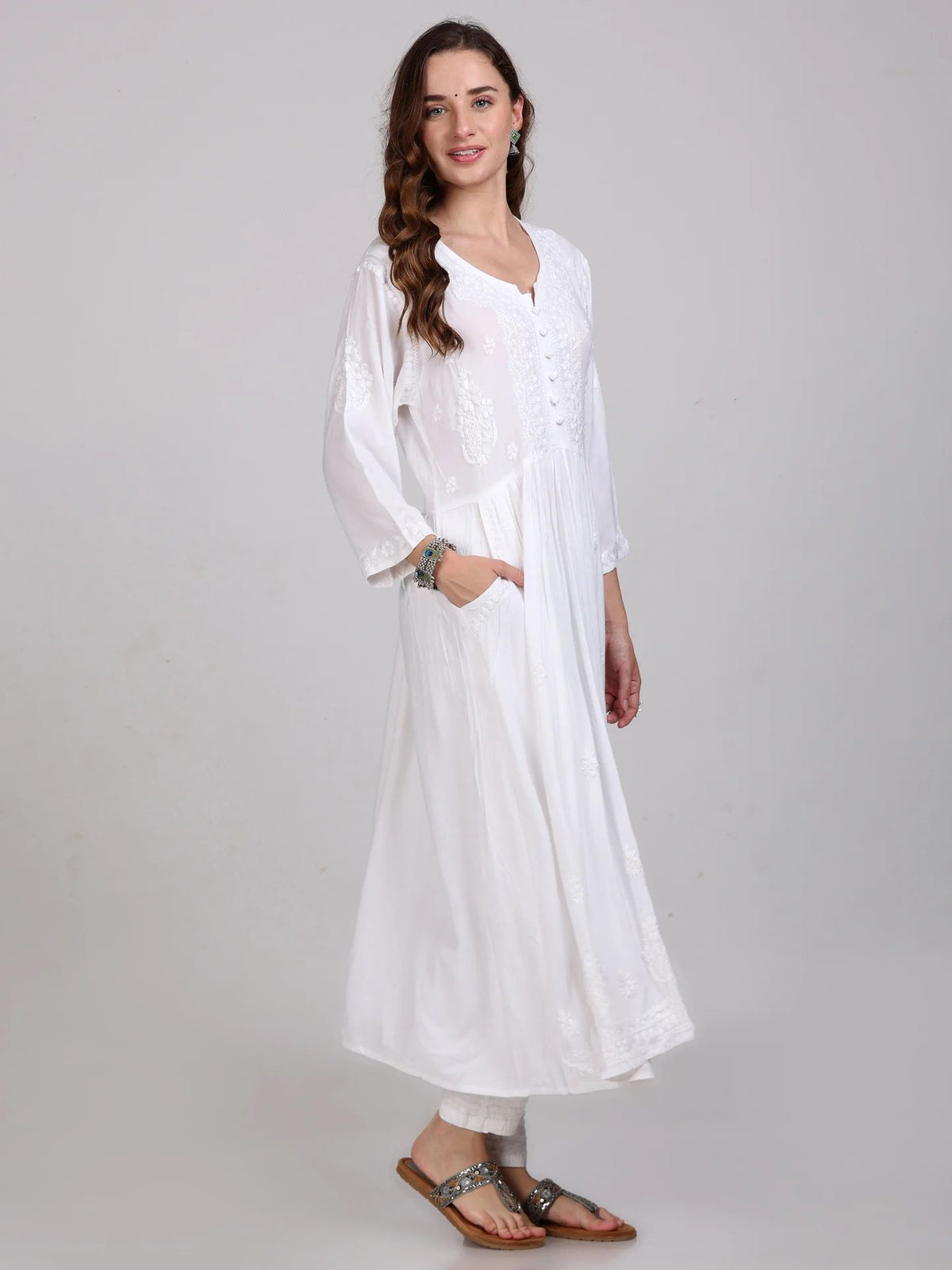 white chikankari long dress with pockets, side view