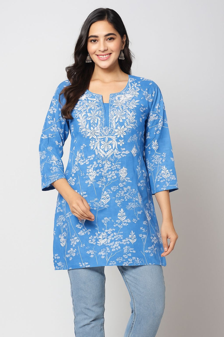 model wearing Chikankari printed short kurti, blue with embroidery