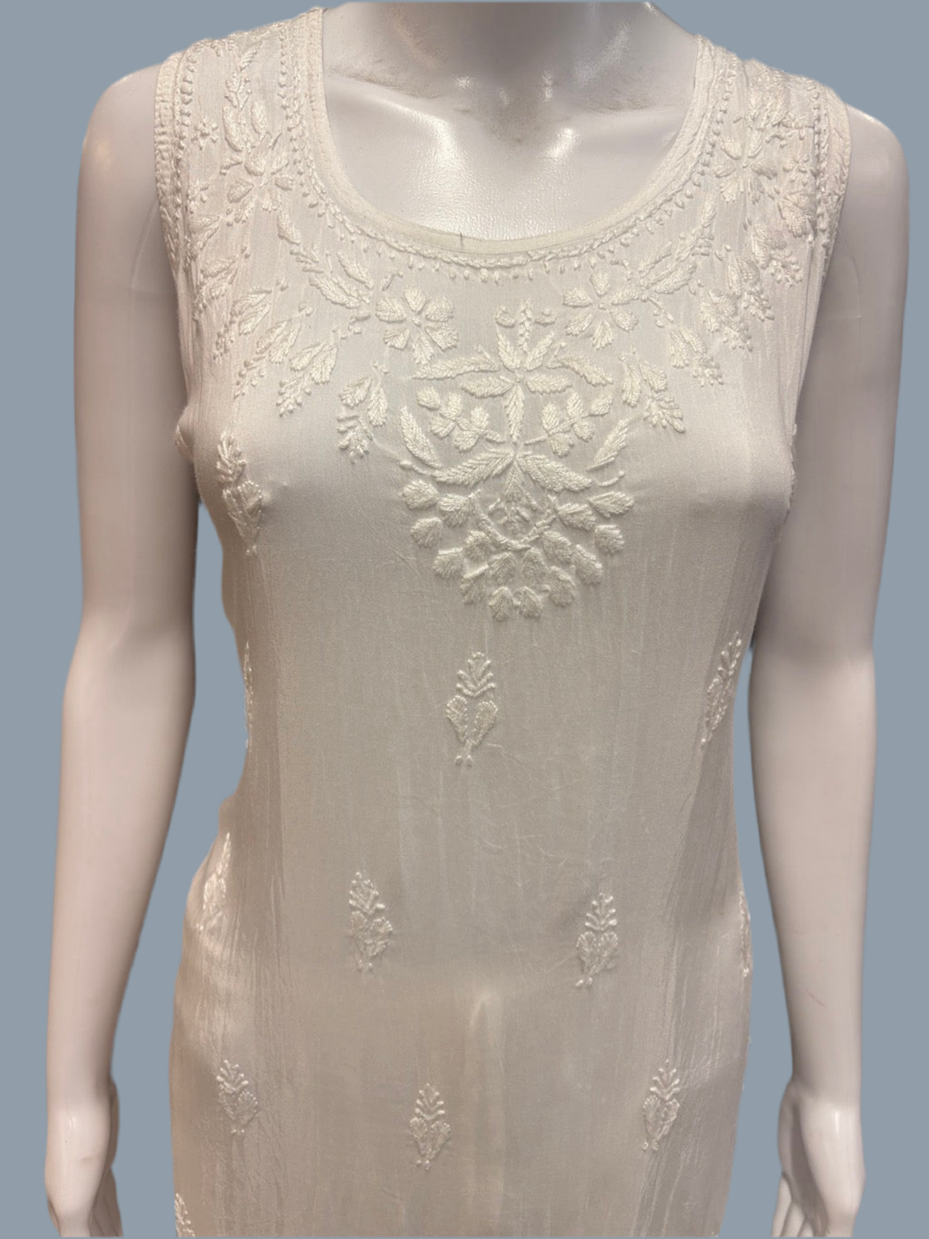 white chikankari summer dress upper close up on model