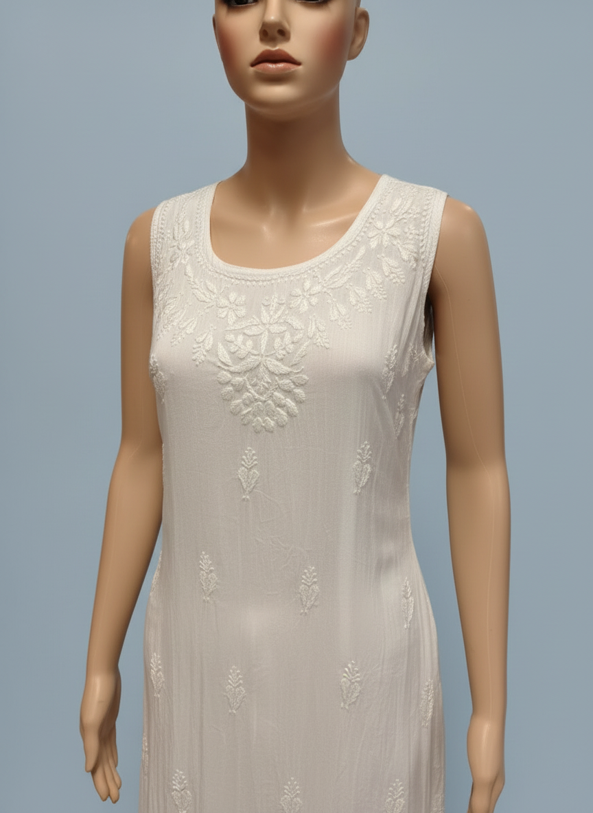 white chikankari summer dress upper close up on model