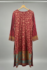 deep maroon colour rear view of kanni silk kurti is displayed in this image.