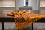 display this shawl on a table in a posh way for famaza couture