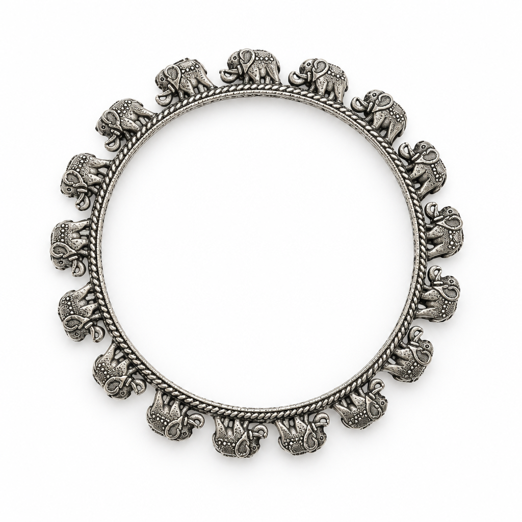 Elephant bangle flat lay on white without the black stand