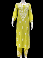mannequin wearing Floral chikankari kurti palazzo set in green with white embroidery