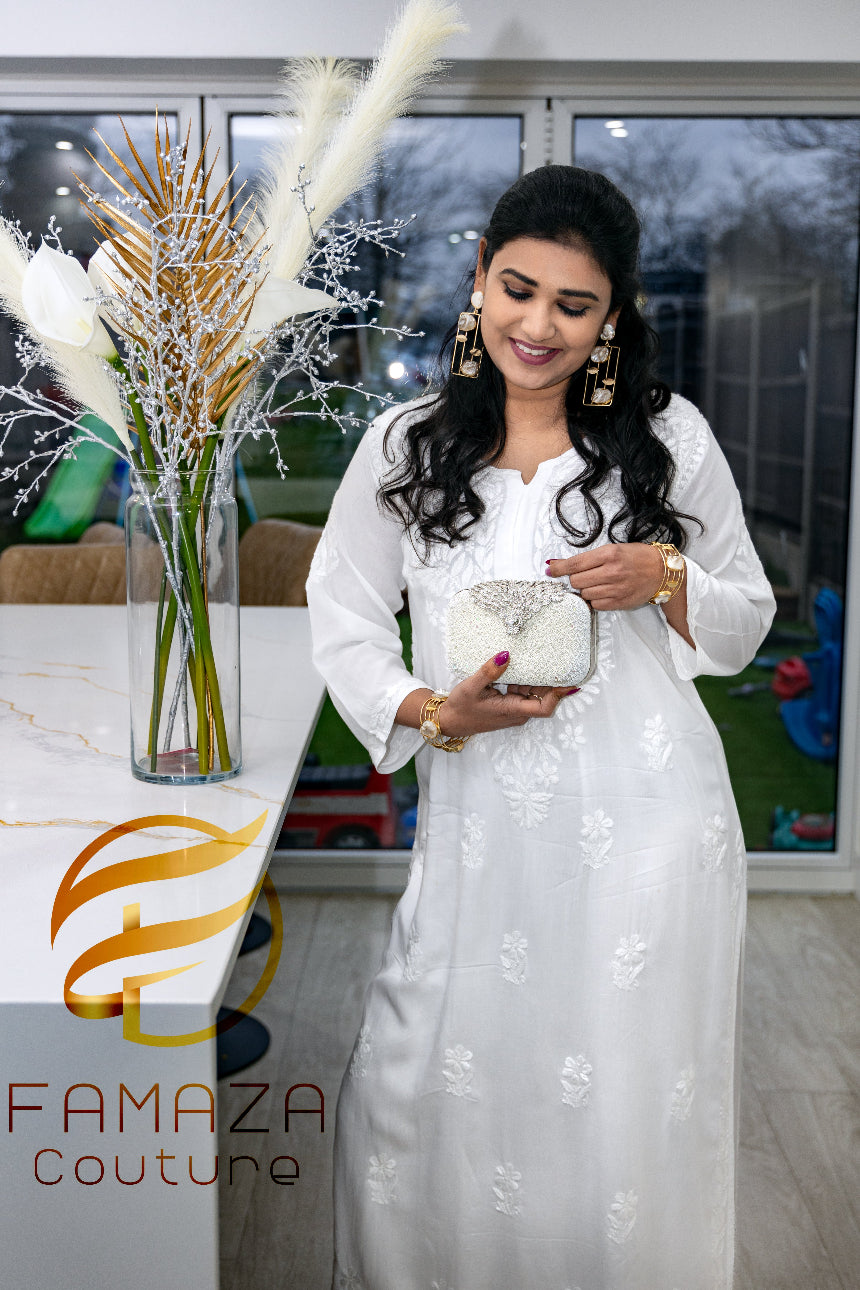 model wearing Floral chikankari kurti palazzo set in white with white embroidery