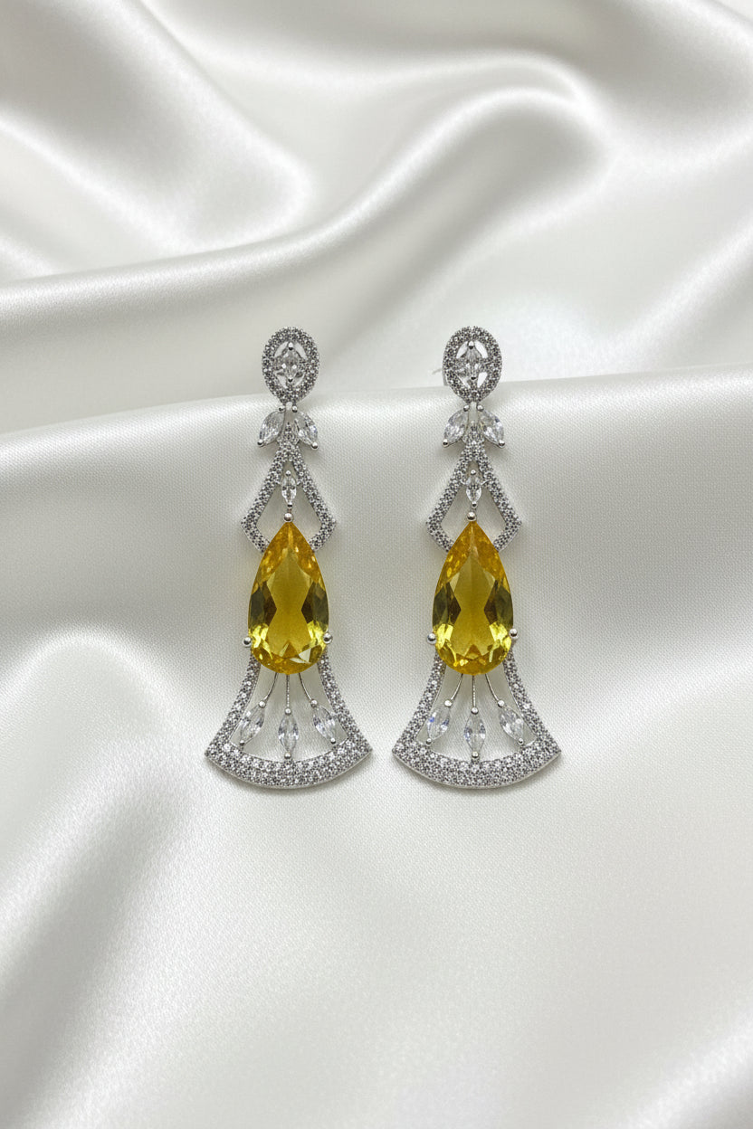 Close-up detail of precision-cut cubic zirconia crystals on the modern geometric hanging statement earrings
