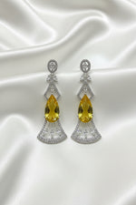 Close-up detail of precision-cut cubic zirconia crystals on the modern geometric hanging statement earrings