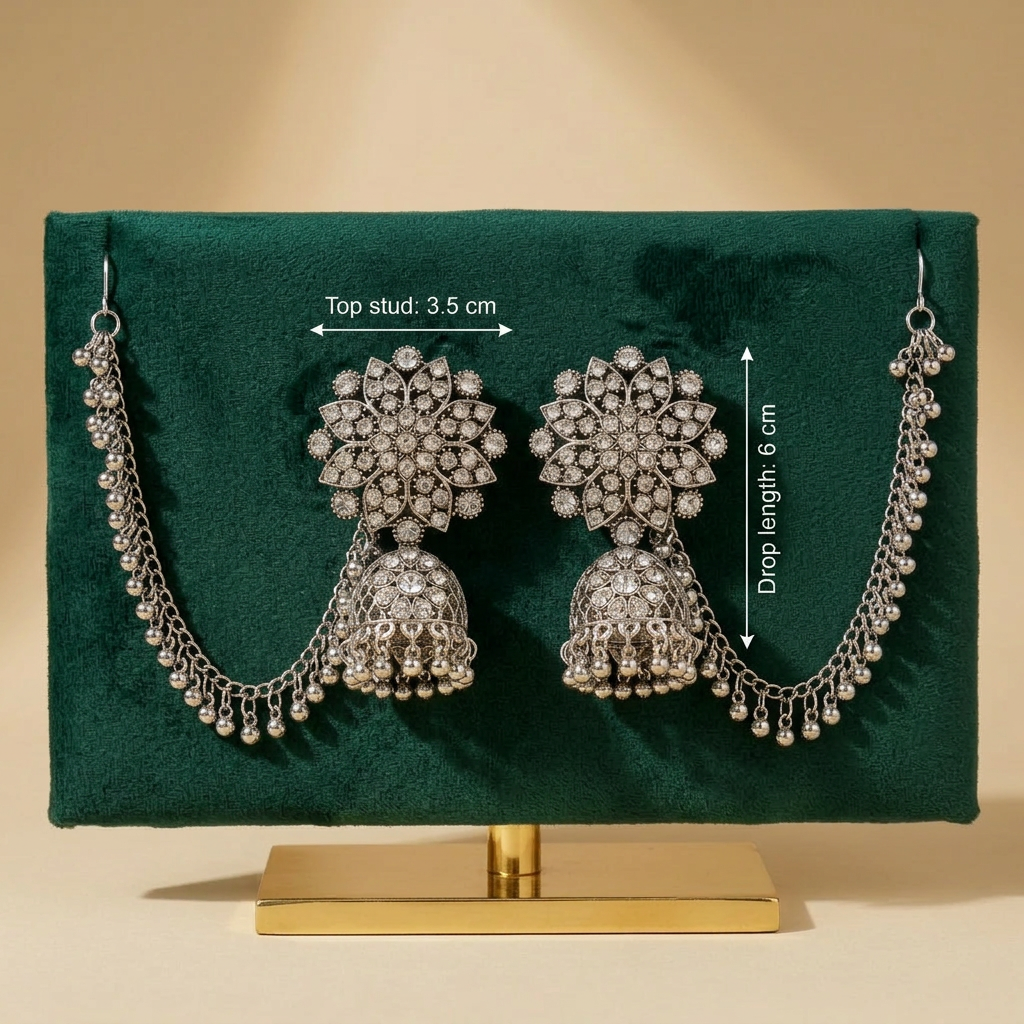 Silver-tone jhumka earrings with sahara chains on a green stand, labelled 3.5 cm top stud and 6 cm drop length