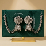 Silver-tone jhumka earrings with sahara chains on a green stand, labelled 3.5 cm top stud and 6 cm drop length