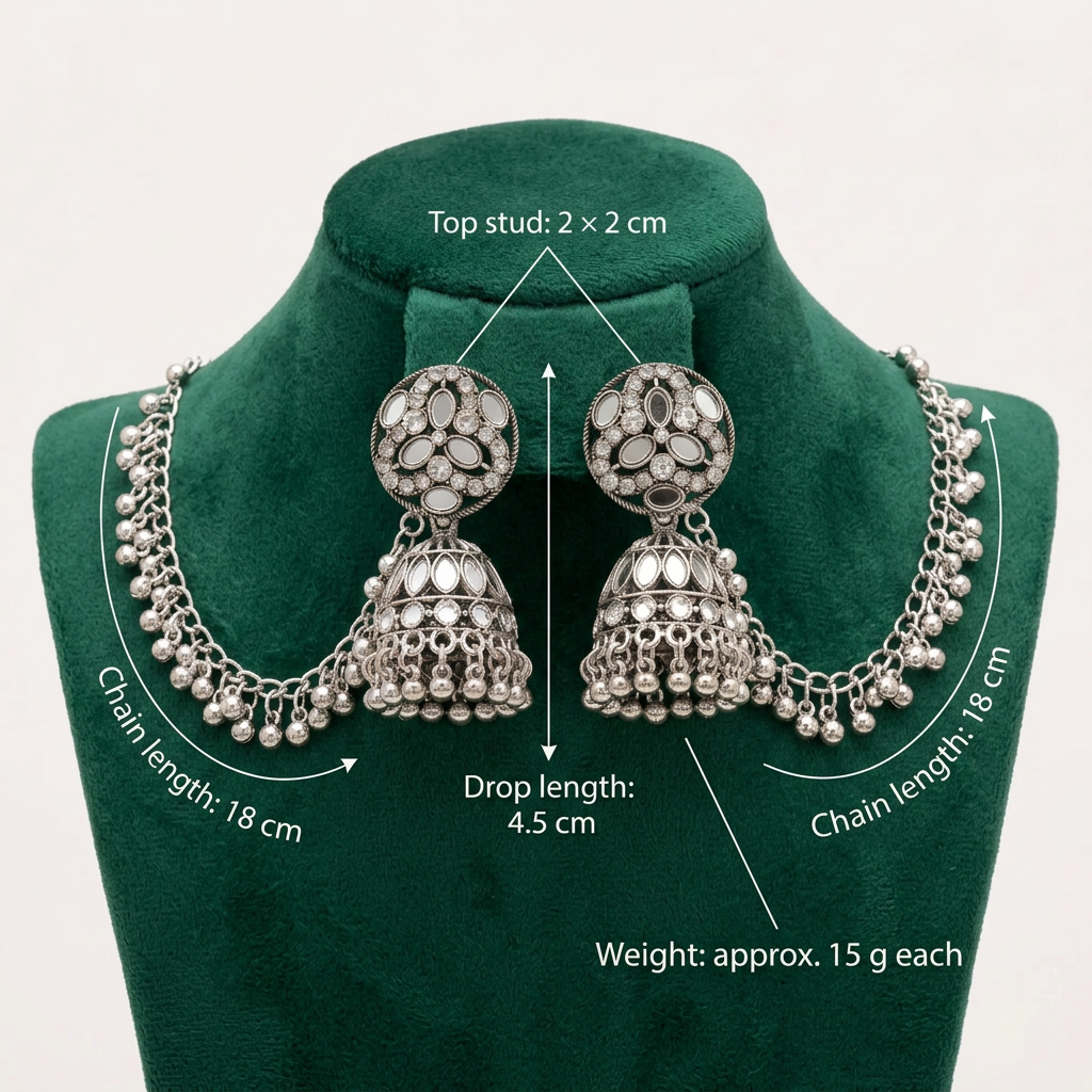 Close-up of Mehr’s mirror-work circular top, ornate jhumka dome, dangling bells and Sahara chain