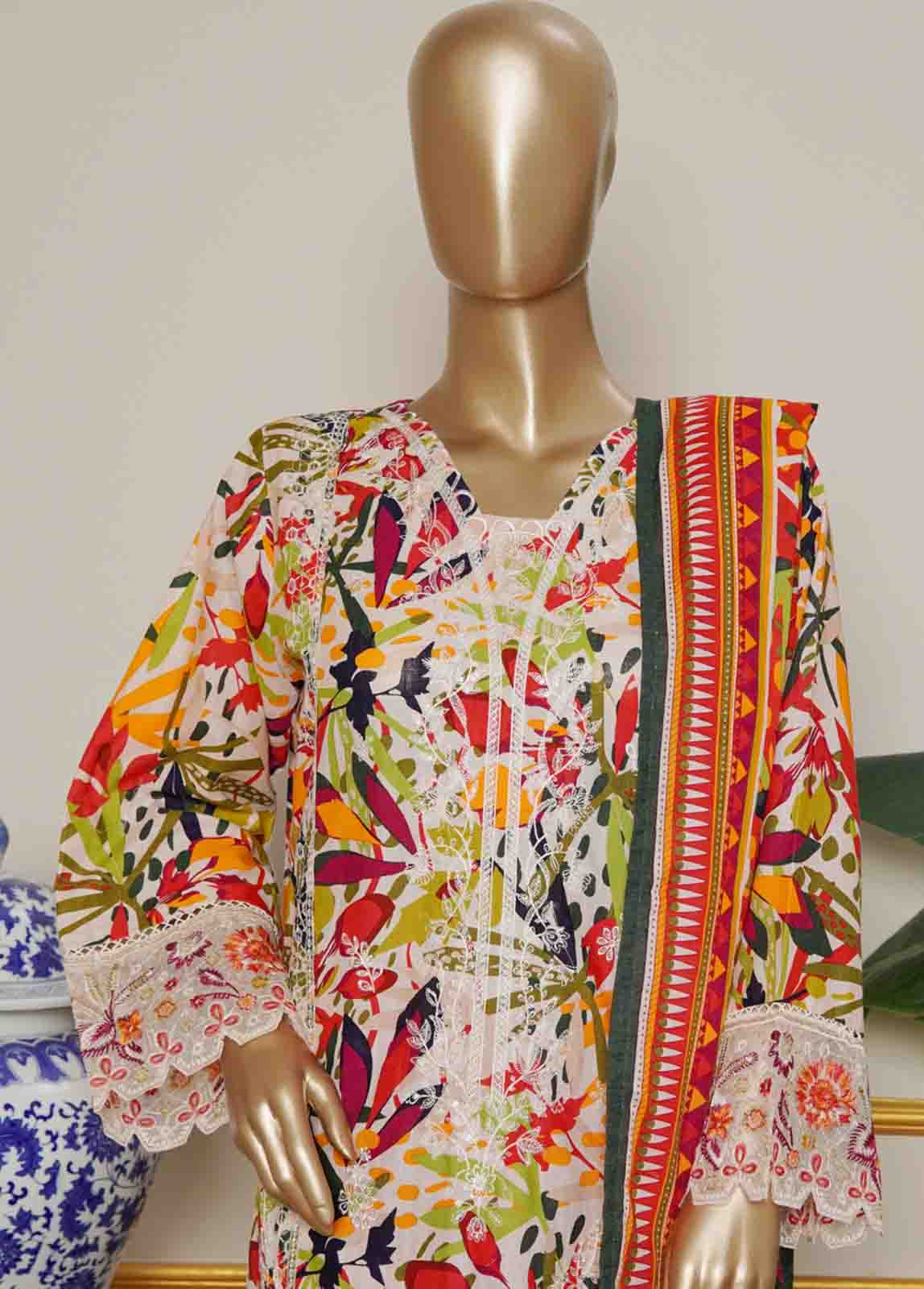 Traditional mirror work embroidery on Pakistani khaddar Eid dress