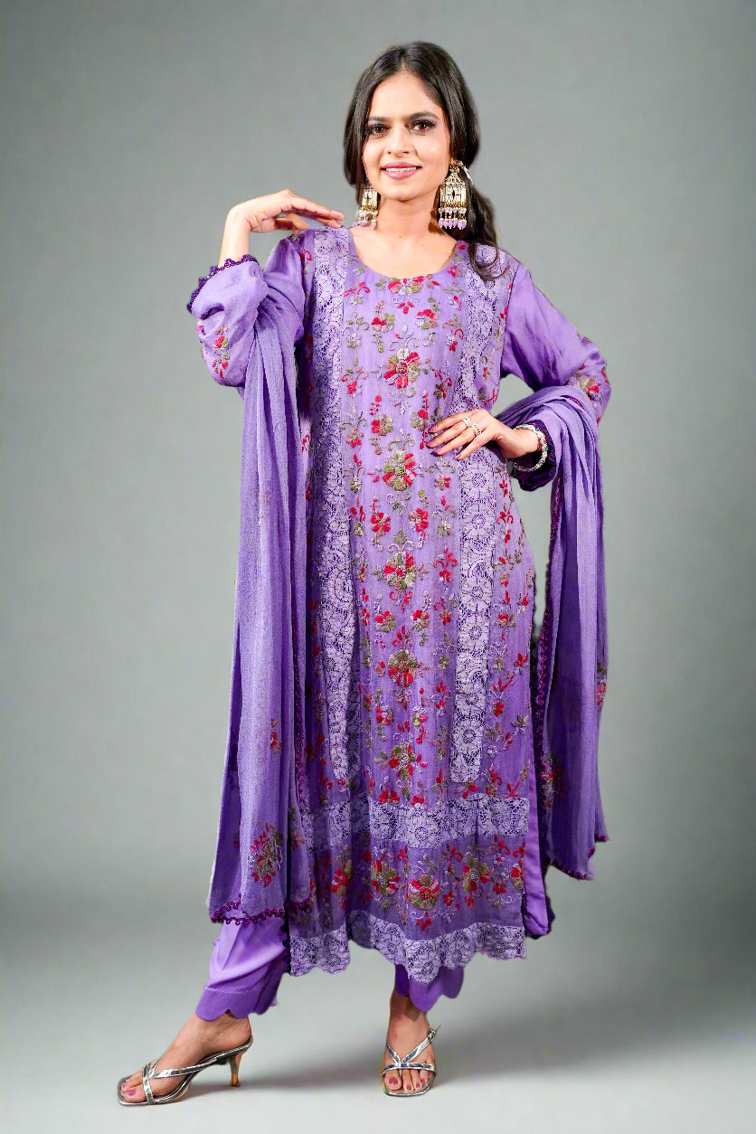 Model wearing Pakistani embroideredpurple suit set