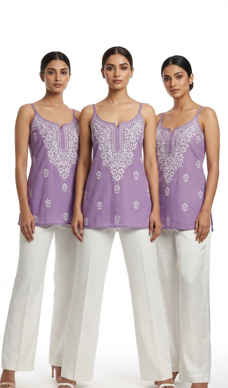 model is showing the purple short tunic in three different styles.