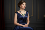 model is wearing this dress and the jewellery set is focused