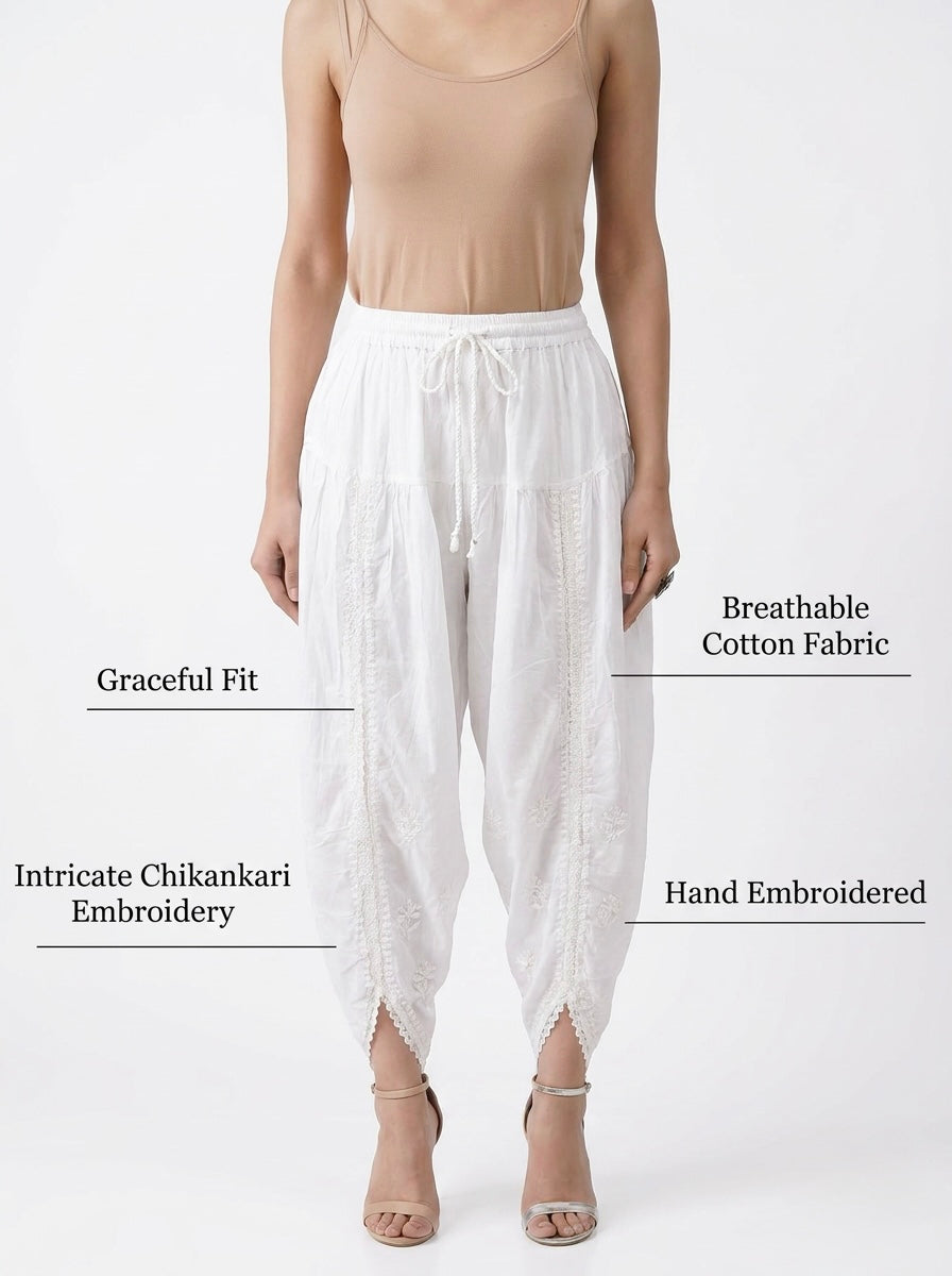 model is wearing white dhoi salwar