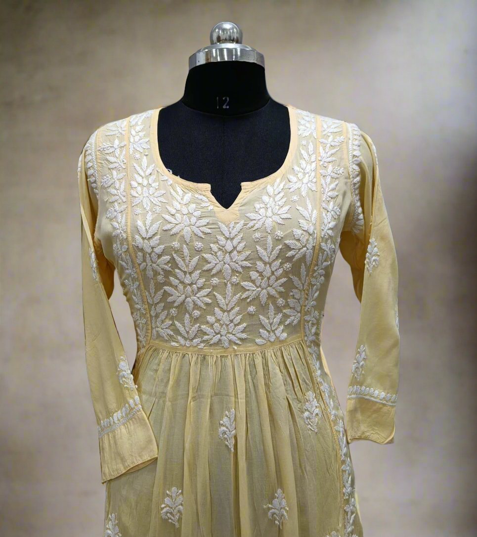Naira cut Chikankari kurti top, close up yellow with embroidery