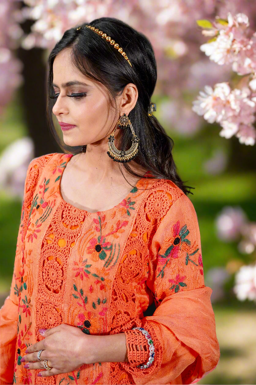 Orange floral embroidered Pakistani suit