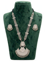 Oxidised silver Afghan Rani Haar Y-shaped necklace set — statement crescent pendant 8.5cm drop × 8cm wide, chain drop 13cm, total weight 25g — mini jhumka stud earrings, black dori cord — displayed on deep green velvet bust stand.