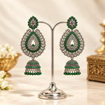 oxidised tone tear drop earrings with bottle green nano stones and hangings are displayed on a silver stand.
