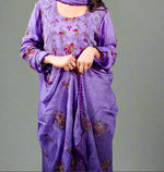Pakistani embroidered suit set with close-up of dupatta floral embroidery detail