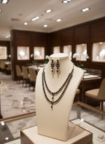 party wear American Dimond black stonesdouble layer necklace with earrings by famaza couture