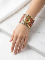 The Persian Coral Peach Sunburst Mosaic openable cuff bracelet by Famaza Couture, showcasing a vintage antique style design.