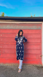 video of woman wearing chikankari kurtiwith ghass patti work in cotton modal fabric