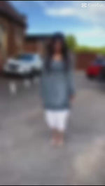 model wearing grey colour chikankari short kurti frock style with hand embroidery and adjustable string