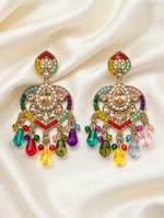 Multicolour heart-shaped chandelier earrings on cream satin, showing oxidised gold-tone frames, faux pearls and colourful bead drops.