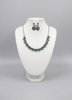 silver oxidised Jewellery setincludes necklace and earrings with blue stones in centre by famaza couture