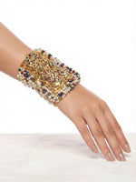 The Empress Jodha Navratna Pearl & Royal Gold Cuff bracelet by Famaza Couture, featuring a traditional Mughal-style bridal design