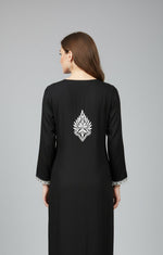 the back side design is showing of thisblack modal kurti with white hand embroidery in a Ghass Patti pattern and booti work. The kurti length is 46 inches