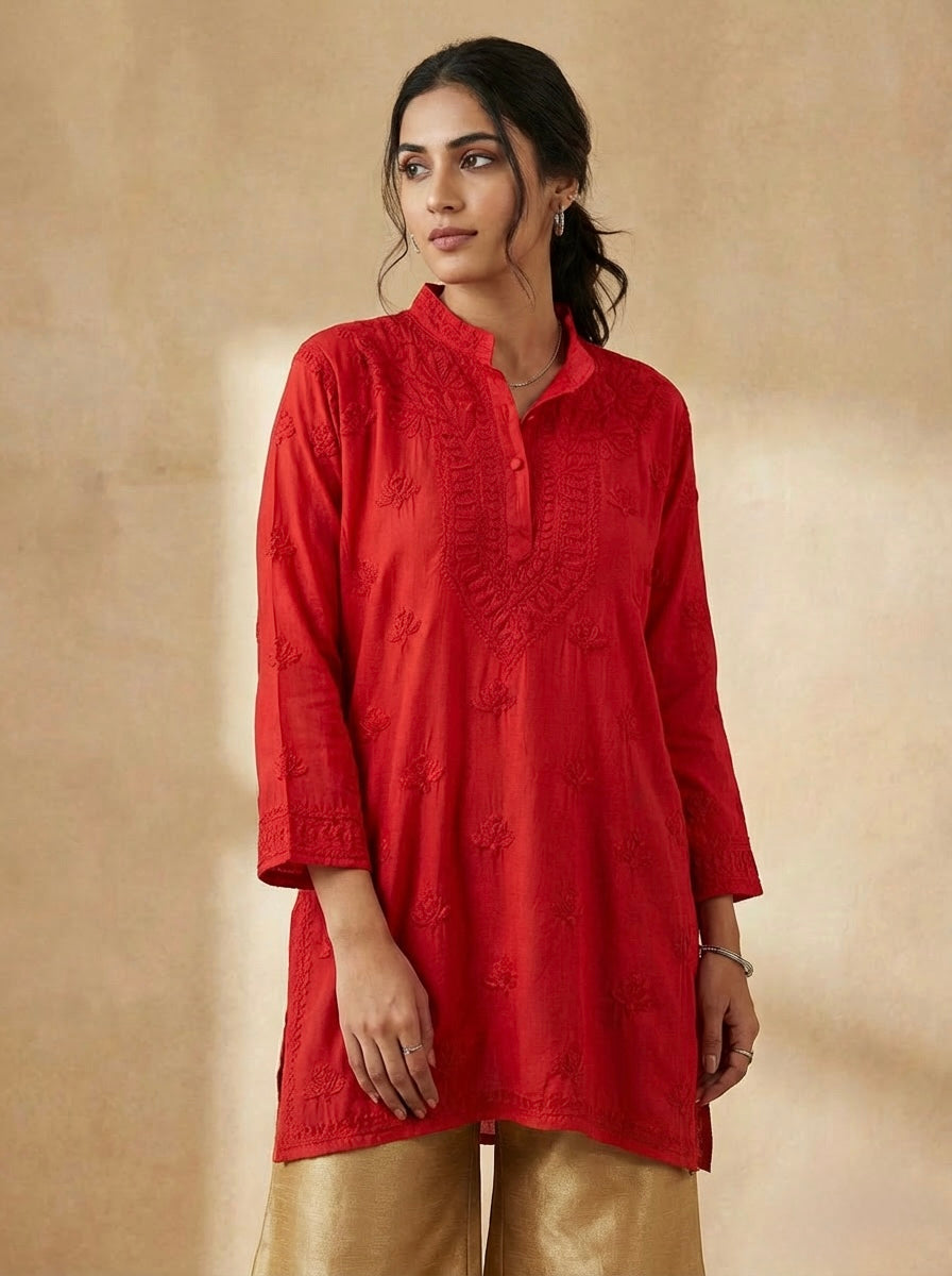 The red short kurti with tone to tone hand embroidery