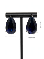 Navy blue teardrop crystal earrings with measurements showing 2 cm length and 1.5 cm width.