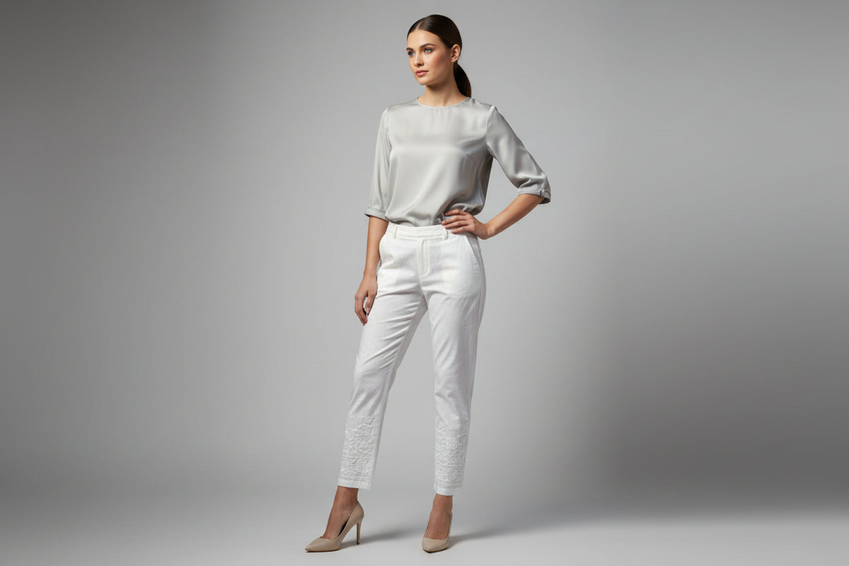 White embroidered cotton pants with floral detailing on cuffs – Famaza Couture
