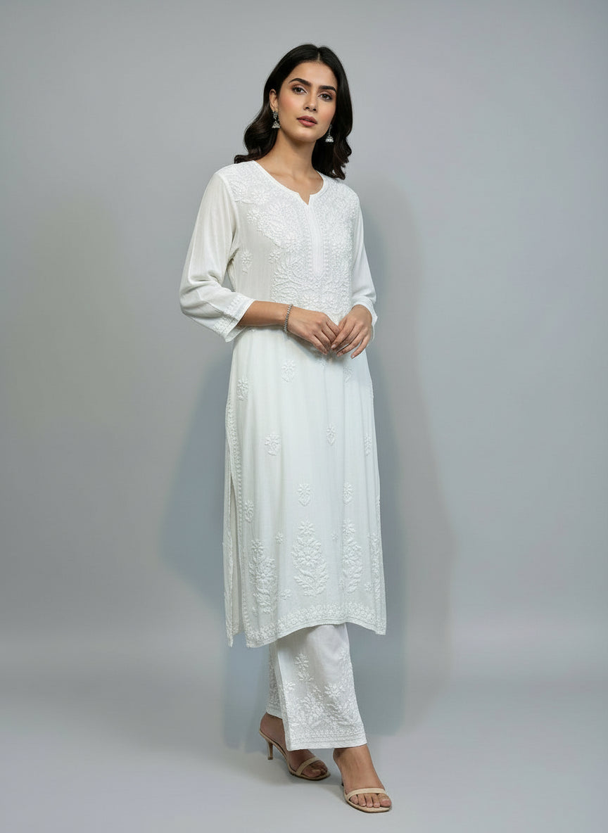 White colour rayon fabric plus size kurti and trousers with white thread chikankari embroidery on the kurti and trousers.