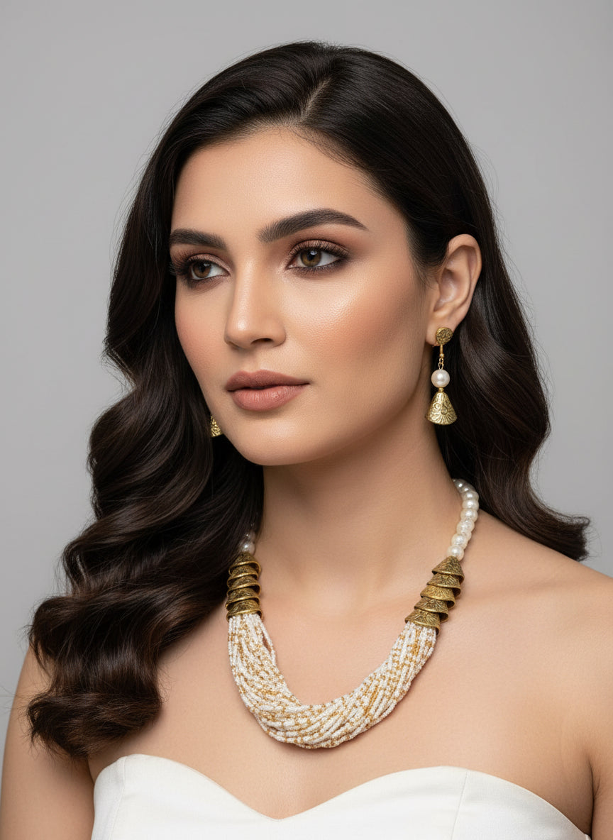 white with golden braided necklace jewellery set with gold accents and matching earrings by famaza couture