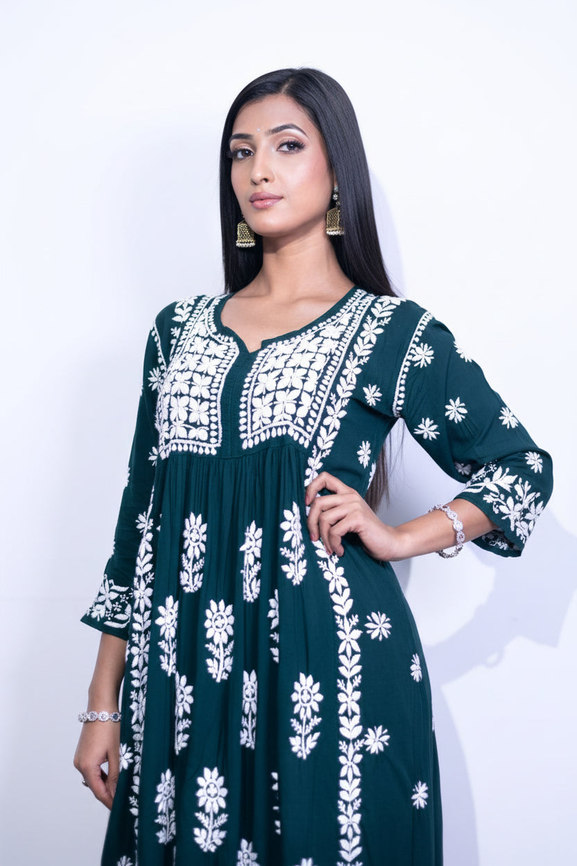 Close up of elegant embroidery work on front of the naira cut gown style Chikankari kurti top