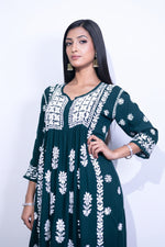 Close up of elegant embroidery work on front of the naira cut gown style Chikankari kurti top