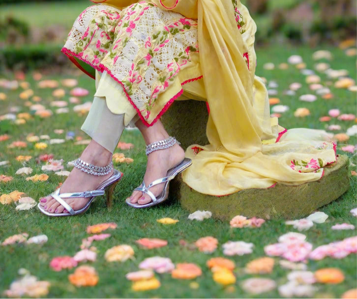 yellow pakistani dress with anklets