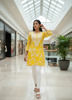 yellow machine embroidered printed short length kurti by famaza couture