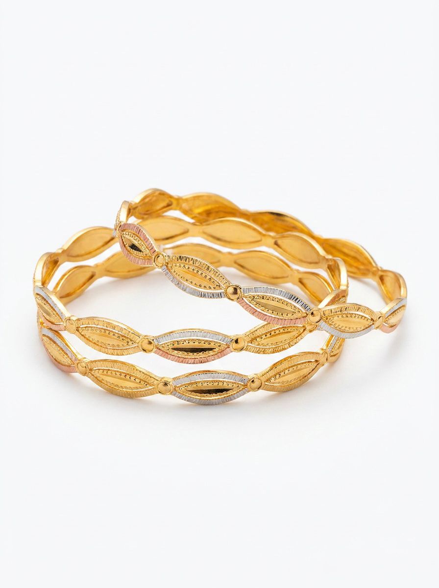 A set of four three-tone micro gold-plated copper bangles featuring an intricate floral lattice and scalloped eyelet design in yellow, white, and pink gold, displayed against a clean white background.
