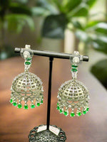 American Diamonds with emerald green stone Jhumka/ Silver Finish Earrings