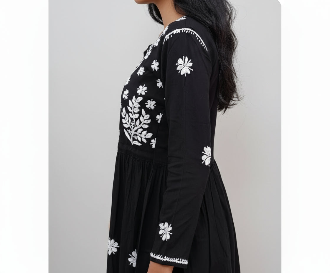 Black short frock with white chikankari embroidery by famaza couture 