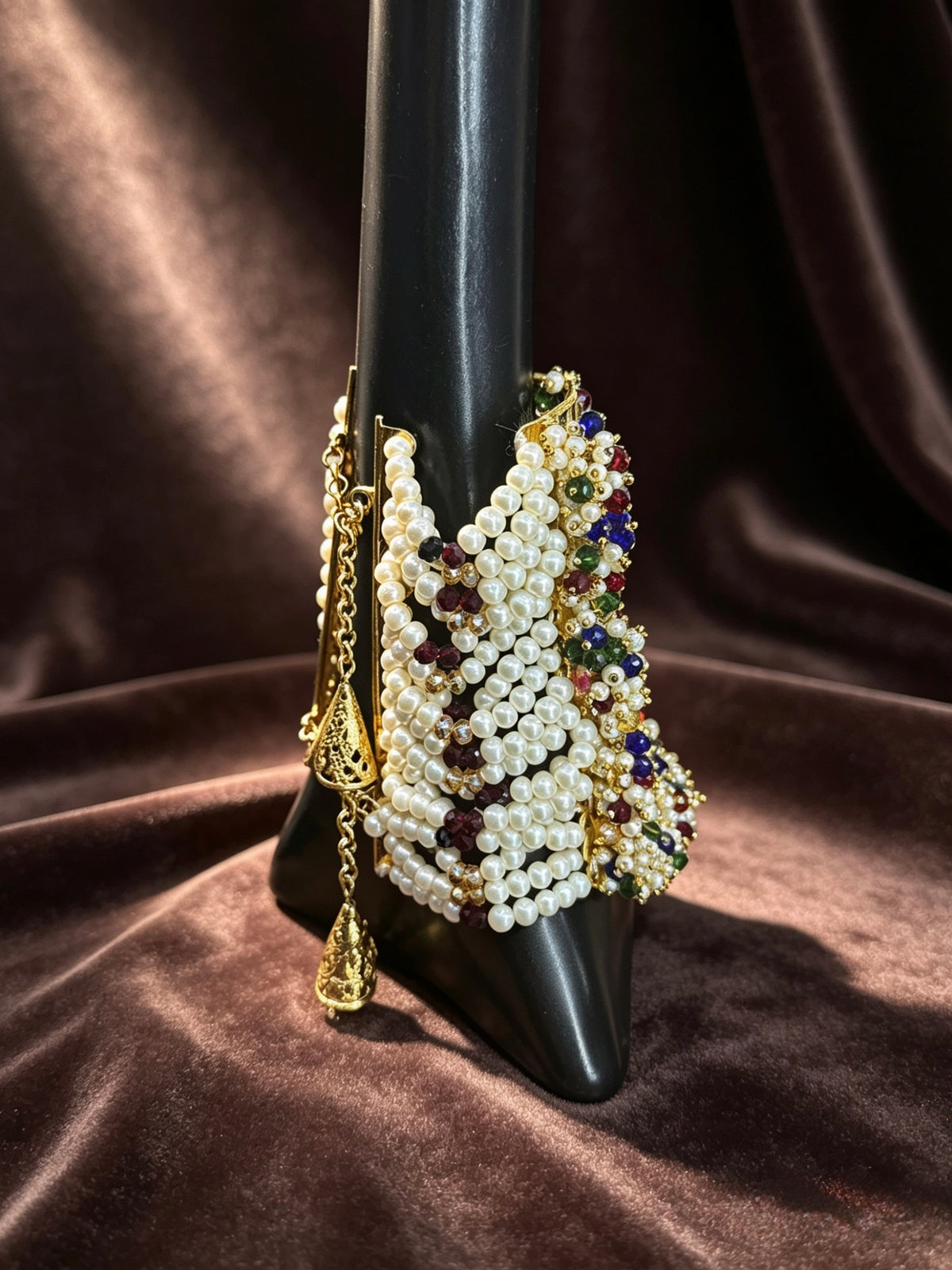 Side profile of the Jodha Navratna bridal cuff highlighting its striking 8.5 cm drop length design