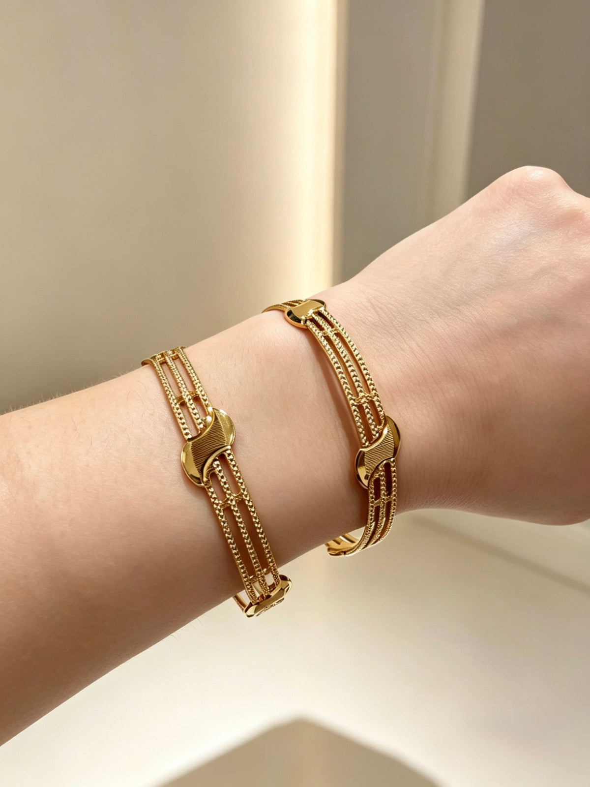 The Aurelia Interlocking Gold-Plated Sculptural Bangles