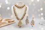 A Gold plated Kundan choker with multi colour nano beads and matching V design mala and matching earrings. 