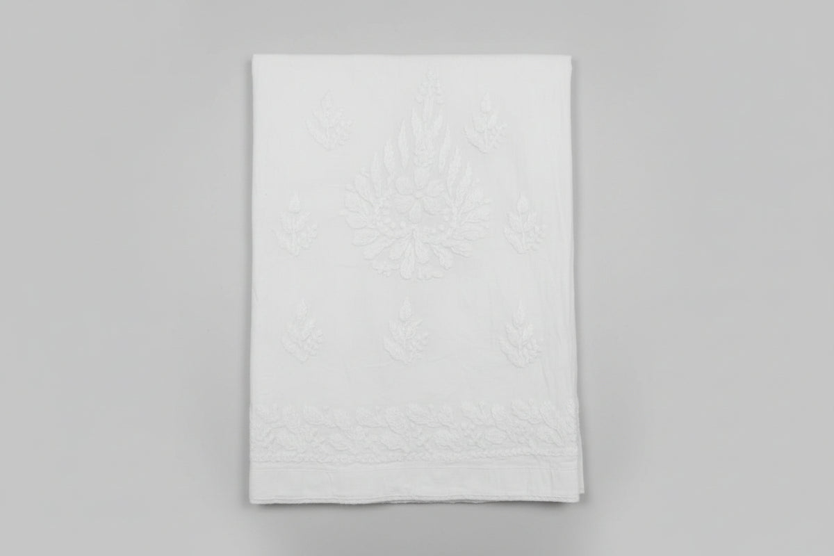 White colour stretchable cotton plus size trousers with pockets on both sides and handmade embroidery on the bottom front and back side.